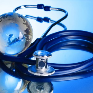 medical13 Globe and stethoscope on blue background